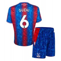 Camiseta Crystal Palace Marc Guehi #6 Primera Equipación Replica 2024-25 para niños mangas cortas (+ Pantalones cortos)